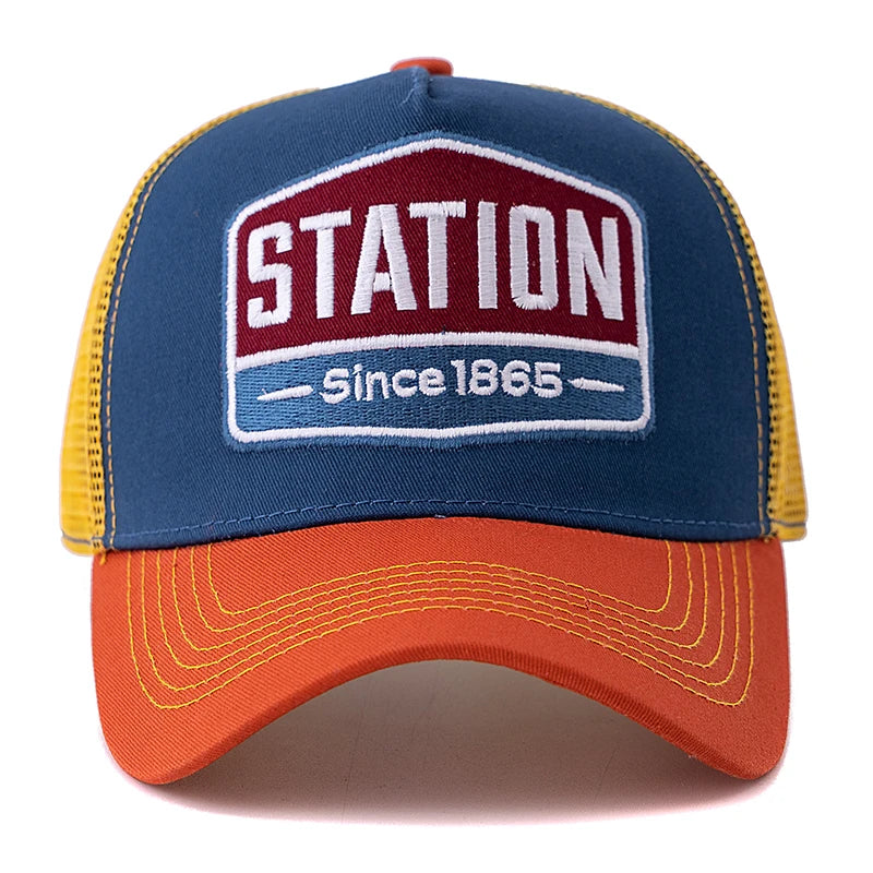 Boné Trucker Station Aba Curva Boné Trucker Station Aba Curva - Laranja e Azul 